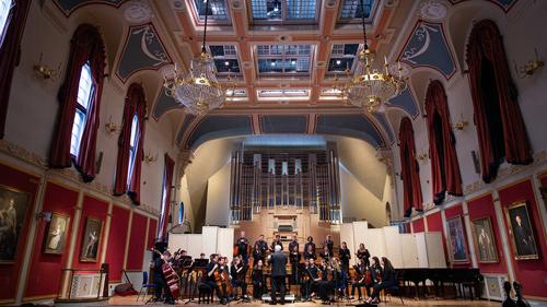 musicians performing in a hall